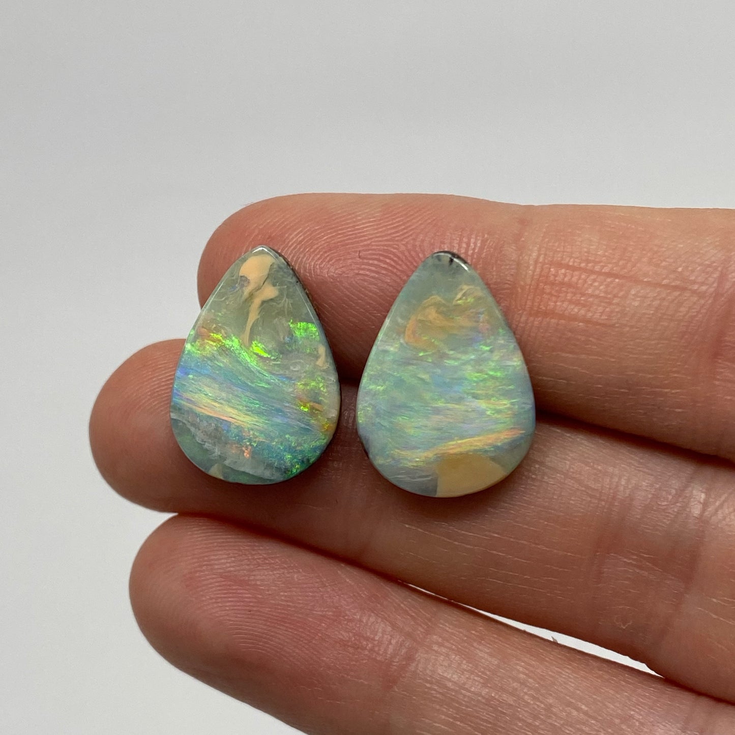 12.14 Ct teardrop boulder opal pair